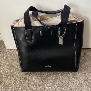 Black Coach Tote Brand New. I do not know the Dimensions